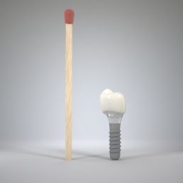 Size of an implant borne artifical tooth uai